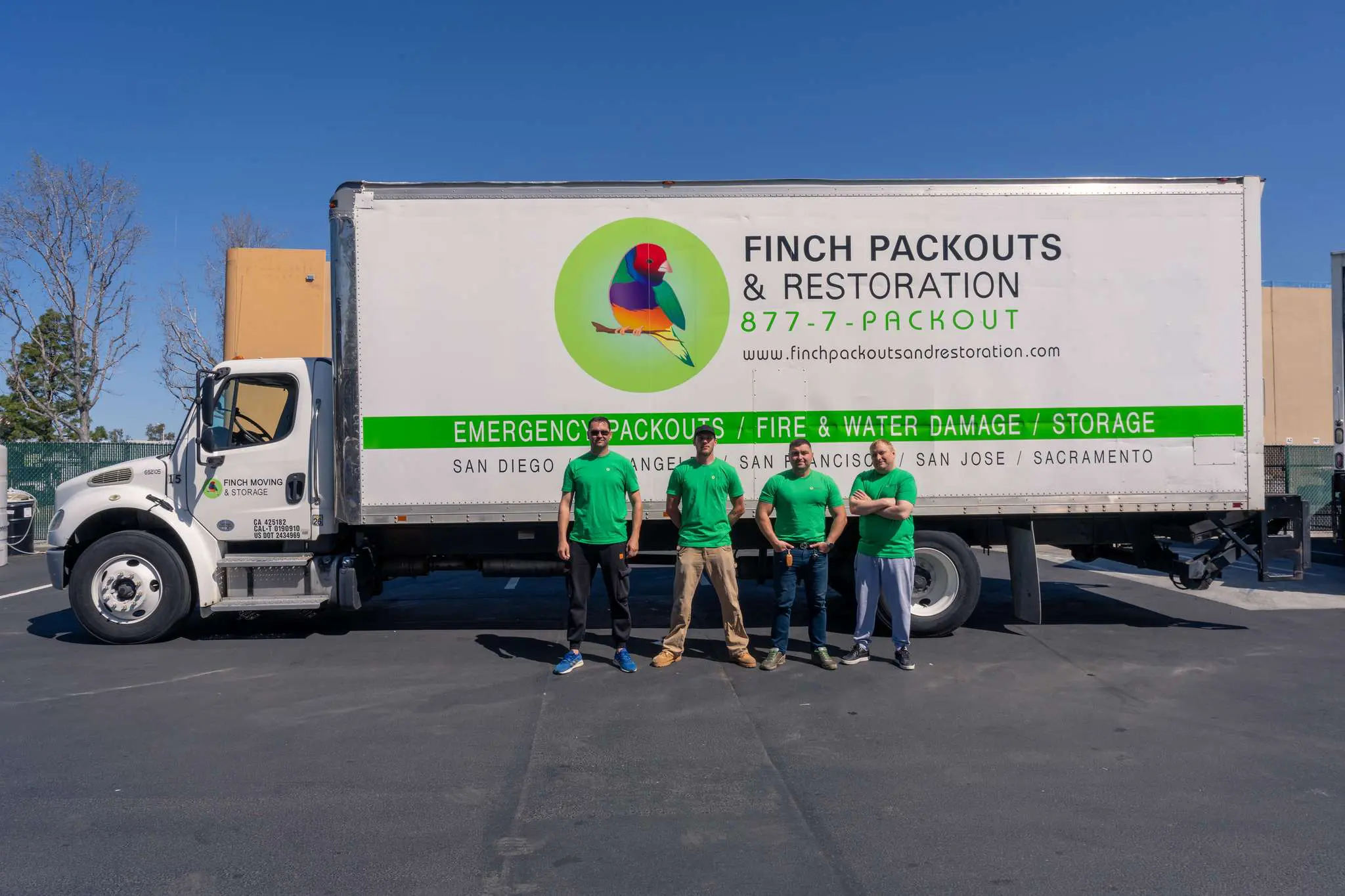 our team crew in front of a service van