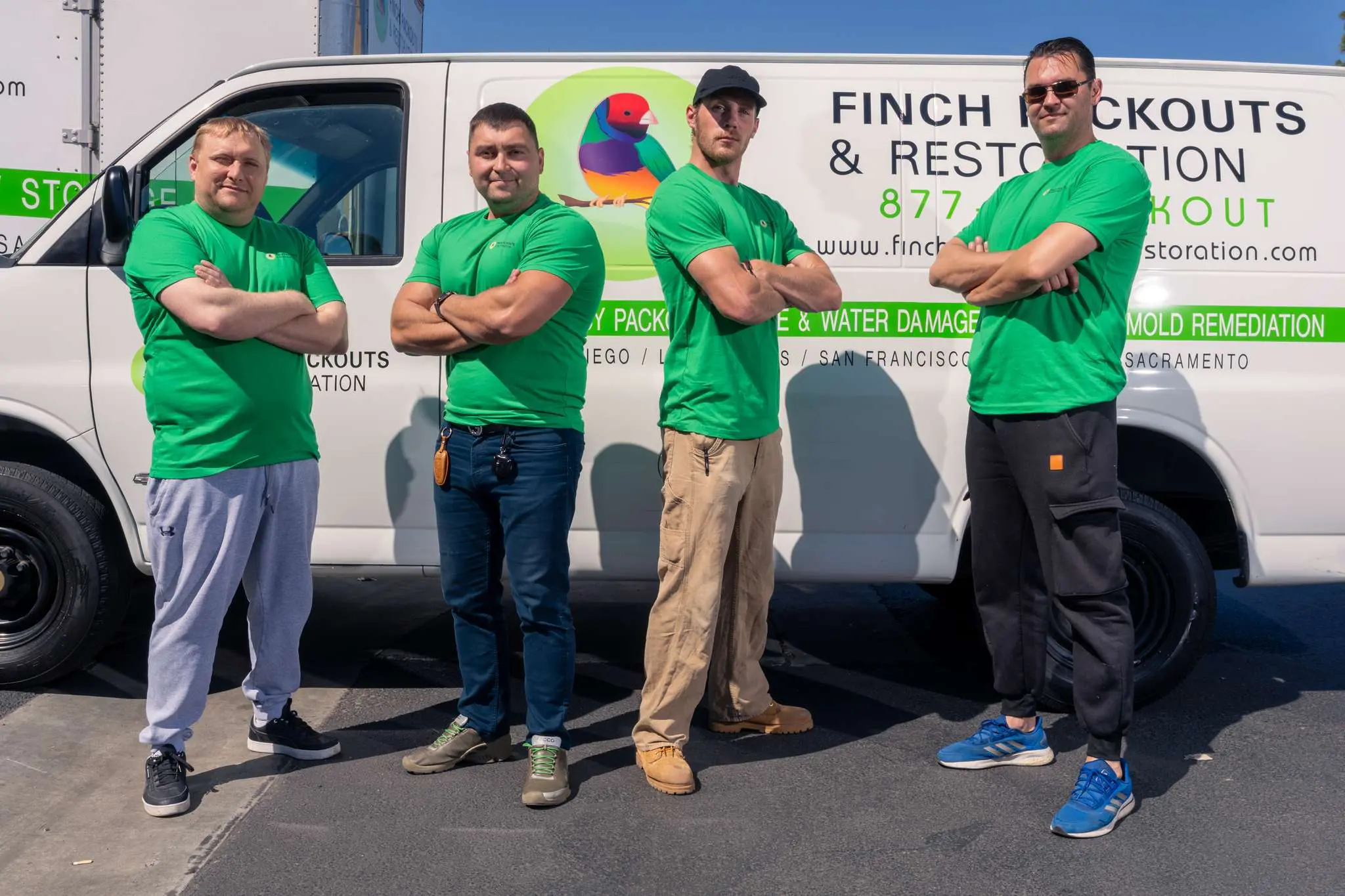 our team packout crew by service van